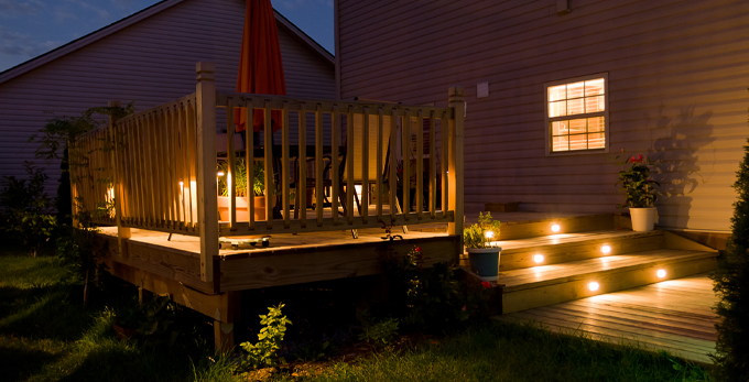 Modern, outdoor garden structure with lightning installed into the decking steps.