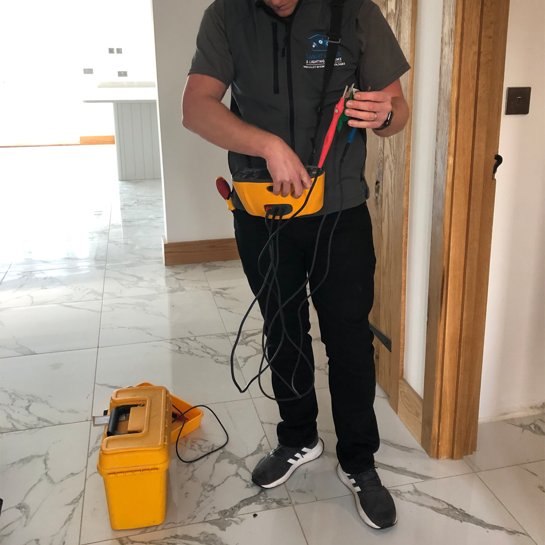 NICEIC contractor using electrical equipment to carry out electrical tests
