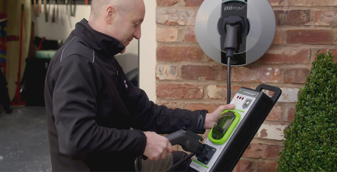 An NICIEC approved contractor, installing and testing electrical vehicle charging point, brand podpoint. At a clients household.