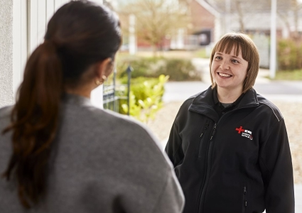 Homeowner greeting NICEIC contractor