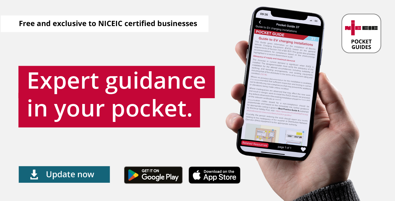 An approved NICEIC contractor, holding a digital tablet looking through the NICEIC award-winning pocket guide app.